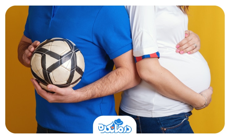 تصویر یک خانم باردار به همراه یک مرد که یک توپ فوتبال در دست دارد