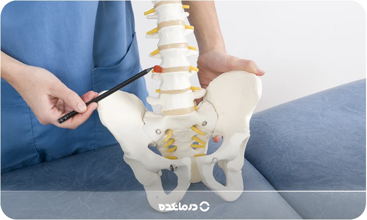 پارگی دیسک کمر چیست؟ [۱۴ علت و علائم + روش های تشخیص]